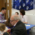 Families engaging in craft activities together